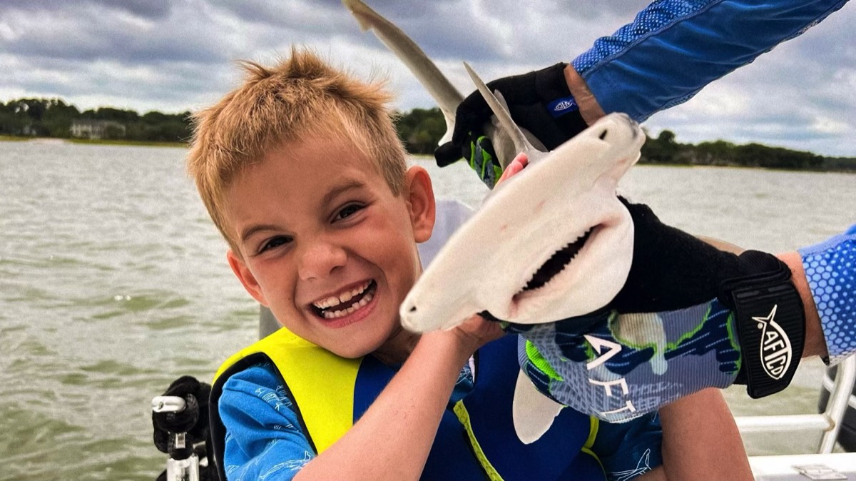 Boy with Hammerhead Shark Fishing Charter in Hitlon Head